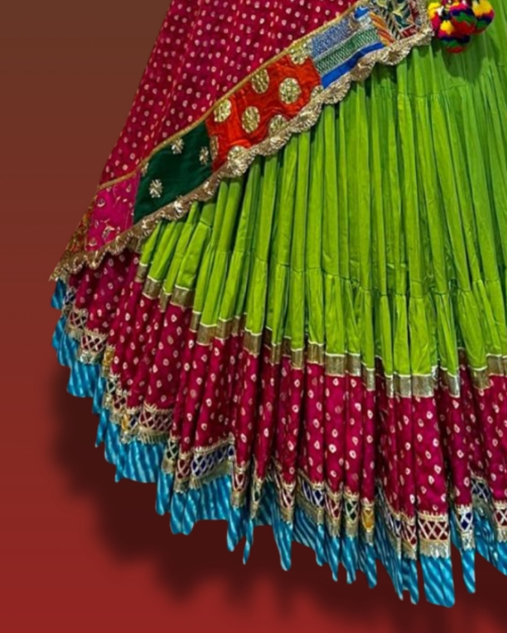 Green and Red Gujarati Navratri Chaniya Choli with Bandhani Print and Multicolor Patch Border