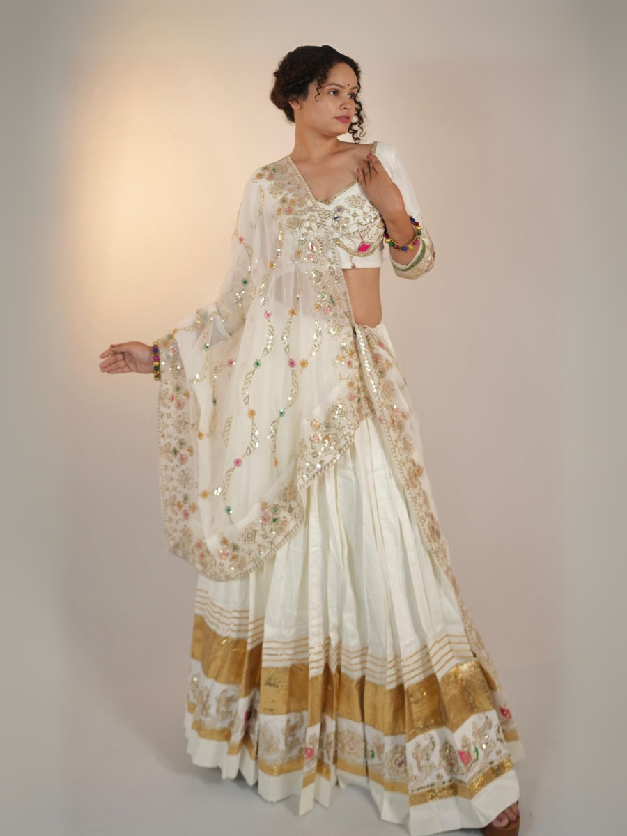 Ivory Elegance Mirror & Gold Work Lehenga Set
