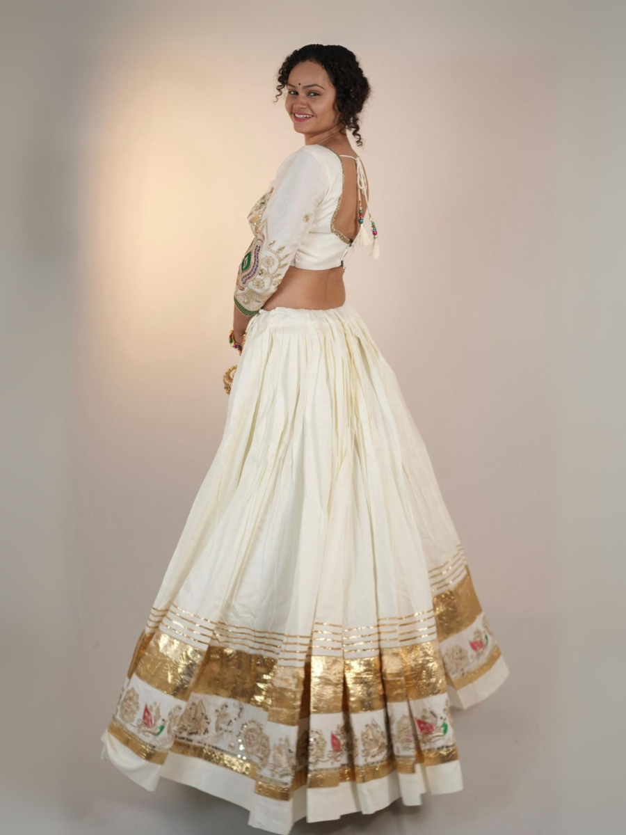 Ivory Elegance Mirror & Gold Work Lehenga Set
