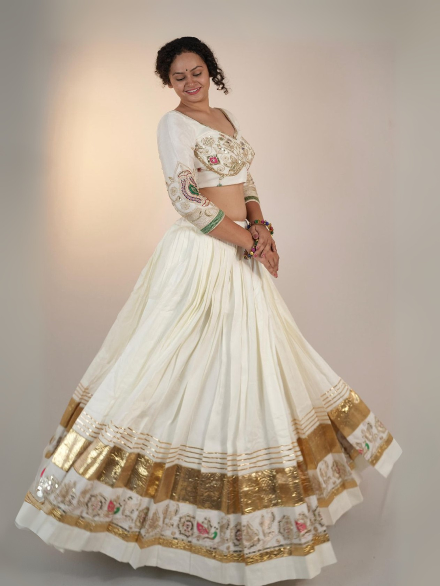Ivory Elegance Mirror & Gold Work Lehenga Set