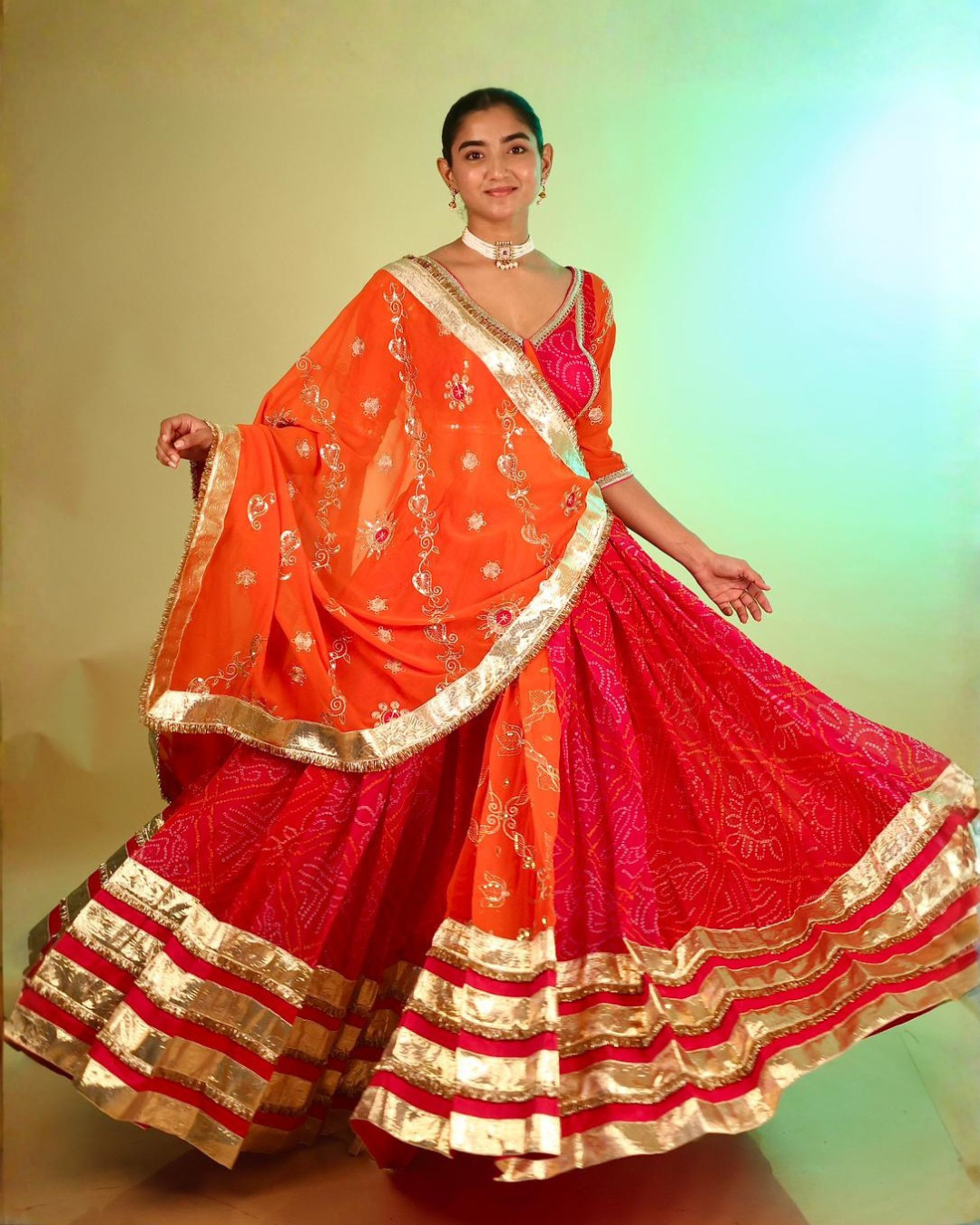 Radiant Orange & Rani Bandhej Chaniya Choli