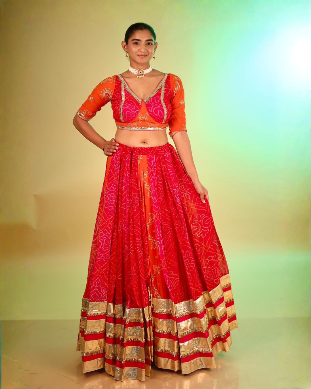 Radiant Orange & Rani Bandhej Chaniya Choli