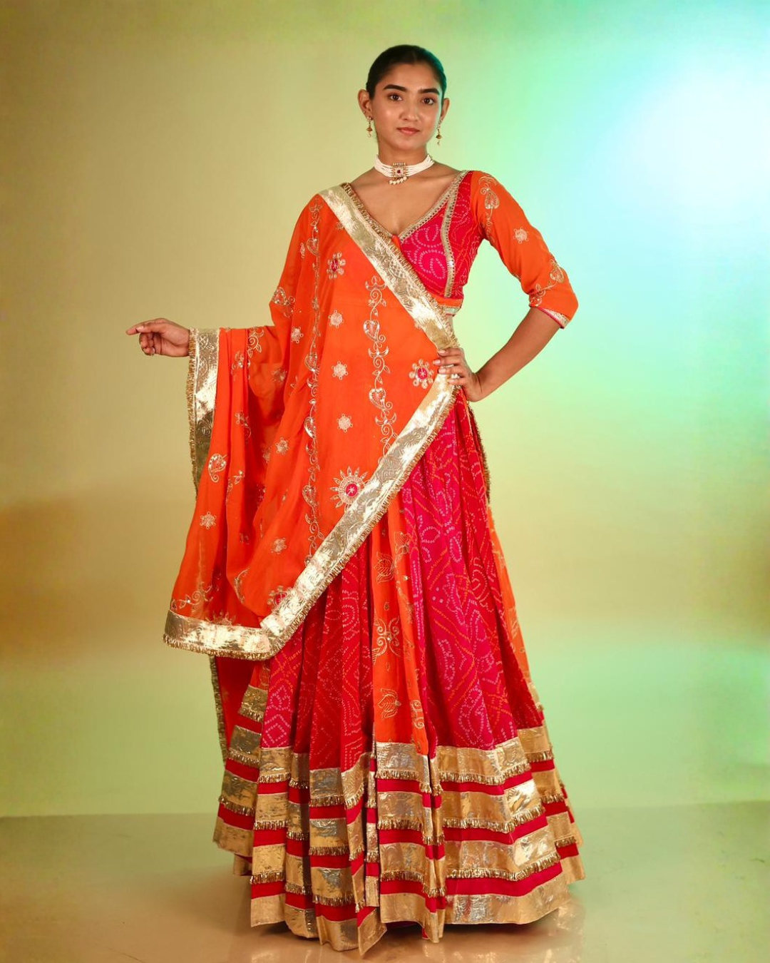 Radiant Orange & Rani Bandhej Chaniya Choli