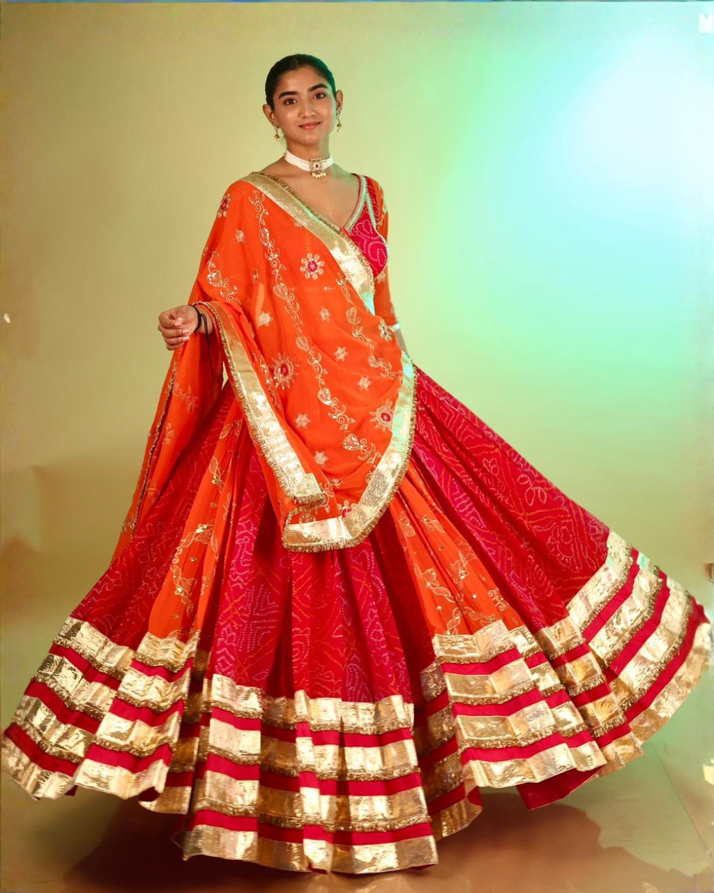 Radiant Orange & Rani Bandhej Chaniya Choli