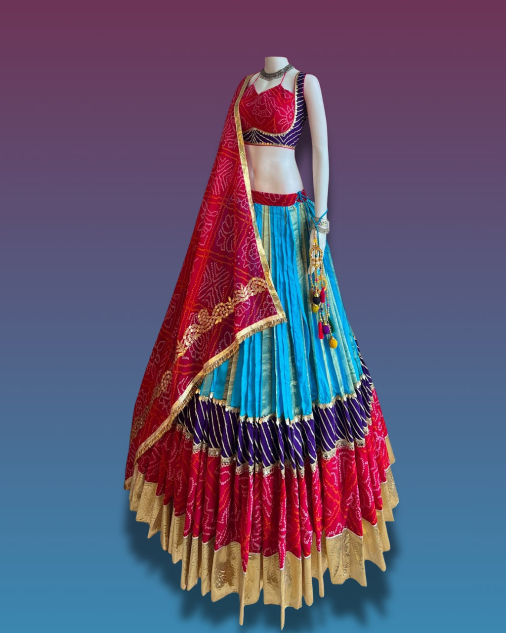 Sky Blue and Red Gujarati Navratri Chaniya Choli with Bandhani Print and Golden Border