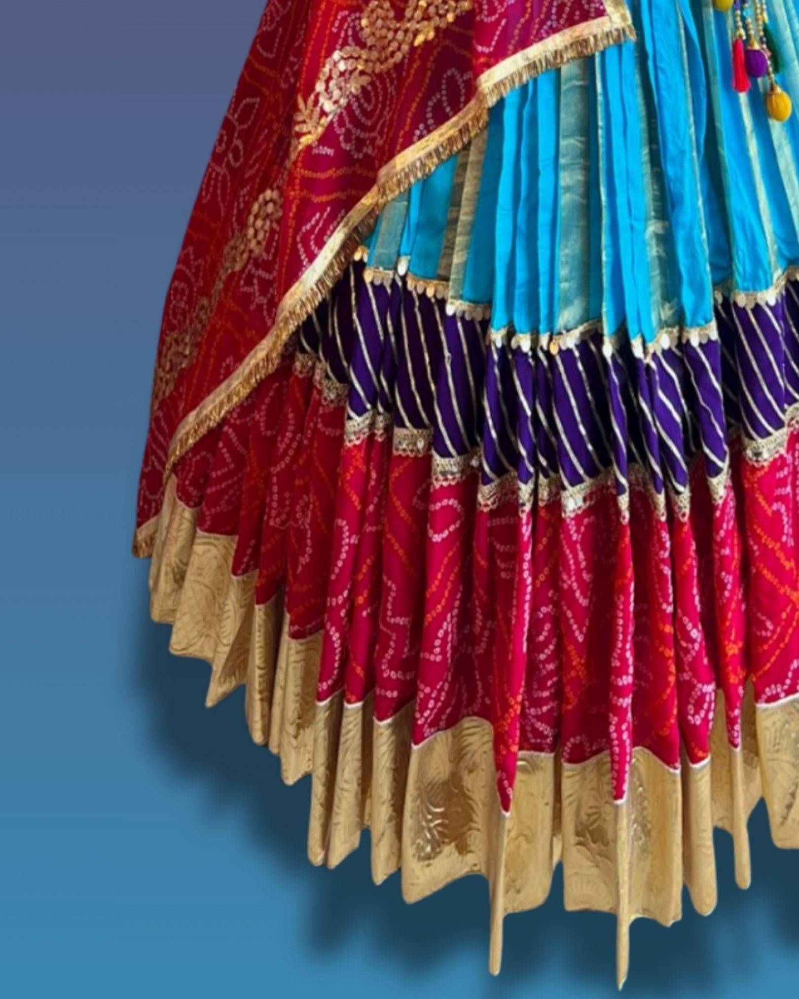 Sky Blue and Red Gujarati Navratri Chaniya Choli with Bandhani Print and Golden Border