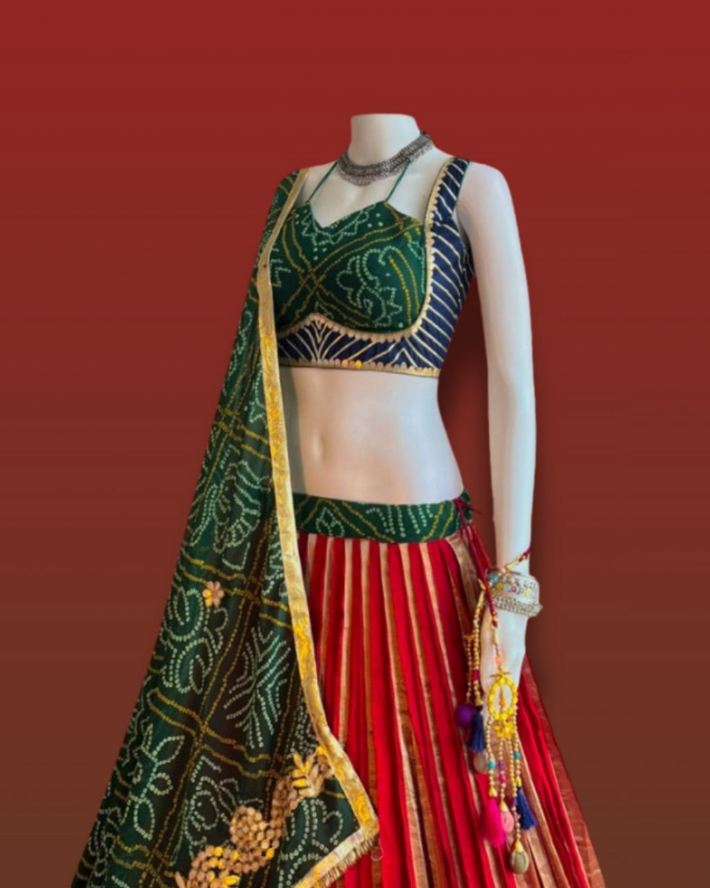 Traditional Green and Red Navratri Chaniya Choli with Bandhani Print and Golden Border