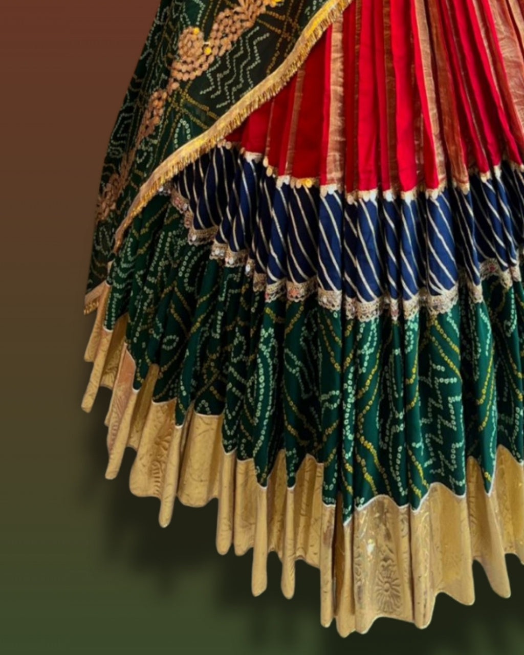 Traditional Green and Red Navratri Chaniya Choli with Bandhani Print and Golden Border