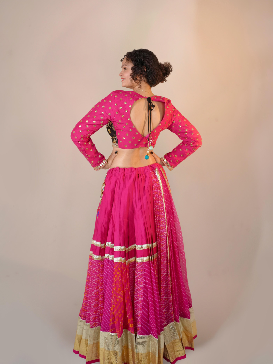 Vibrant Rani Pink Bandhani & Black Velvet Lehenga Set