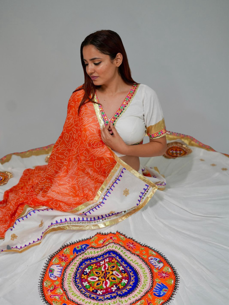 Vibrant White and Orange Traditional Lehenga with Kutchi Mirror Embroidery